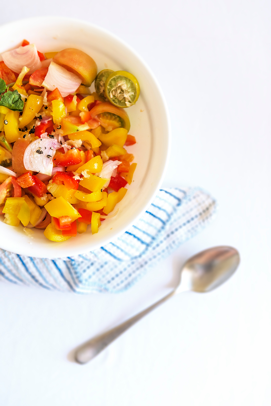 Bell Pepper, Tomato & Onion Salad. Food photography. Photography by professional Indian lifestyle photographer Naina Redhu of Naina.co