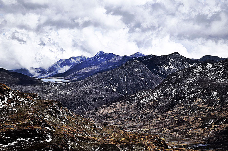 Buy a print of blue mountains from the mountain ranges on the Sikkim - China border from the India side, as photographed by Naina Redhu