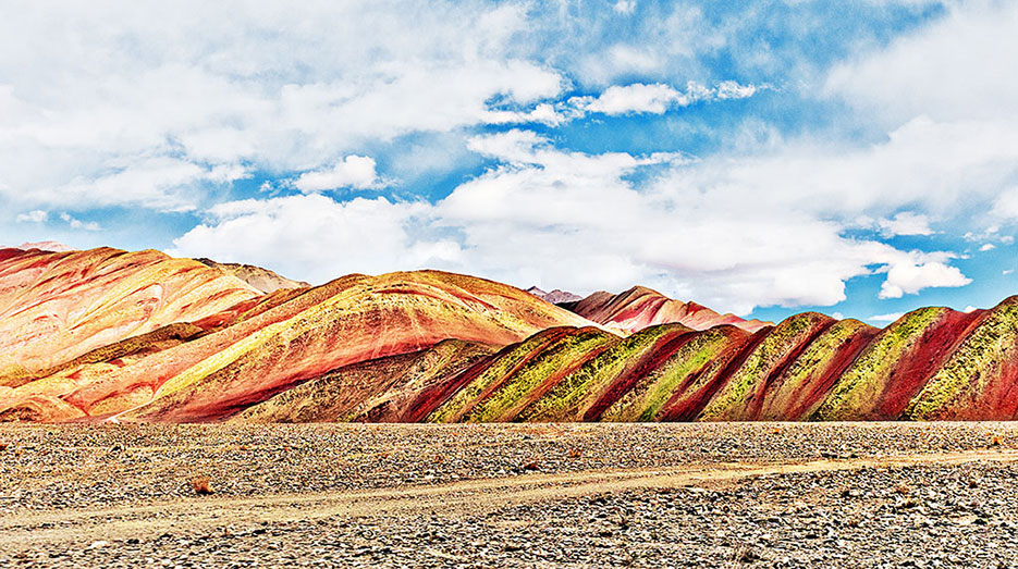 Buy a print of mountains that look like a cinnamon roll. Leh-Ladakh region, India as photographed by Naina Redhu