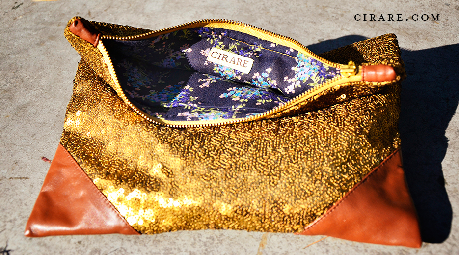 Sequin Grande Clutch in Gold y Label Cirare of Akanksha Redhu. Photography as captured by photographer Naina Redhu.