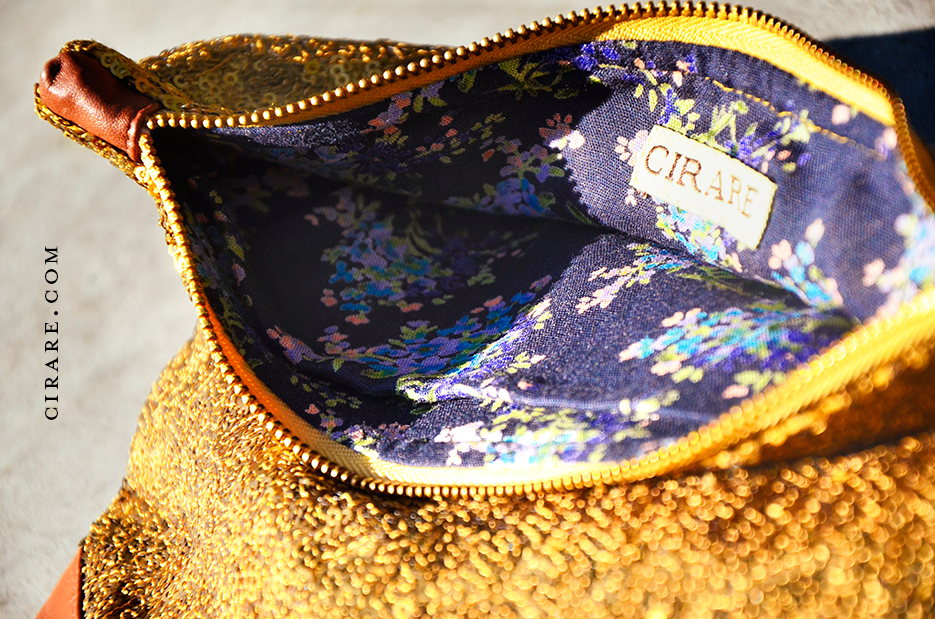 Sequin Grande Clutch in Gold y Label Cirare of Akanksha Redhu. Photography as captured by photographer Naina Redhu.