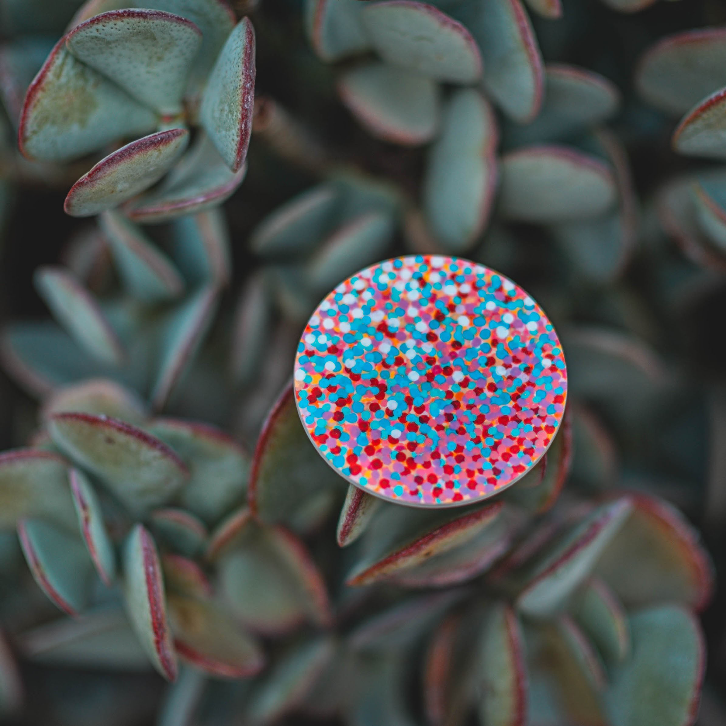 khaosphilos, crimson and turquoise, crimson, turquoise, snow, crimson and turquoise snow, hand painted, wearable art, display art, original art, contemporary art, contemporary artist, naina redhu, naina.co, 3 inches diameter, 3 inch, circular canvas, acrylics on wood, wooden brooch, brooch, art brooch, wearable art brooch, contemporary art brooch,  wearable art jewellery, canvas display, magnet clasp, acrylic painting, khaos philos, chaos lover