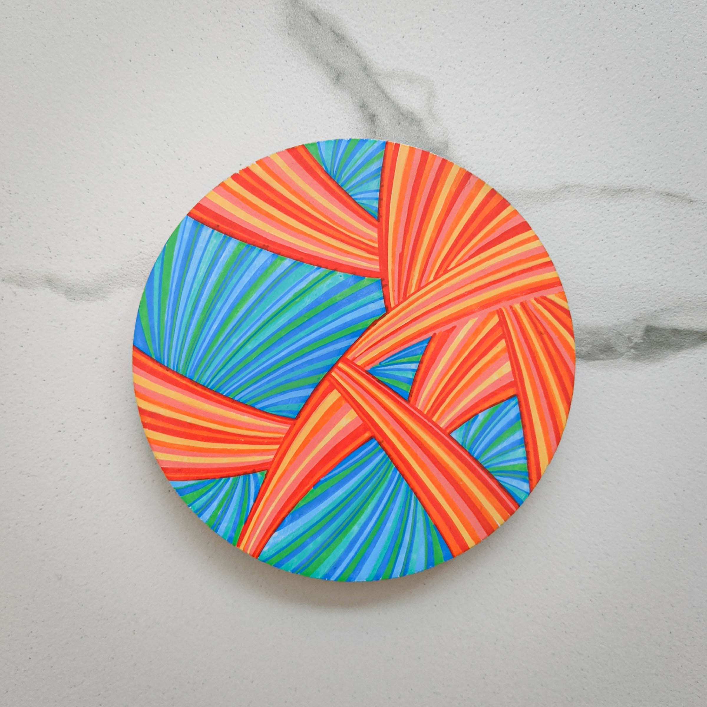 fish tail, saison de poisson, fish season, season of fish, line art, horizons, lines, red, blue, saffron, teal, khaosphilos, crimson, turquoise, crimson and turquoise, hand painted, wearable art, display art, original art, contemporary art, contemporary artist, naina redhu, naina.co, 3 inches diameter, 3 inch, circular canvas, acrylics on wood, wooden brooch, brooch, art brooch, wearable art brooch, wearable art jewellery, canvas display, magnet clasp, acrylic painting, khaos philos, chaos lover