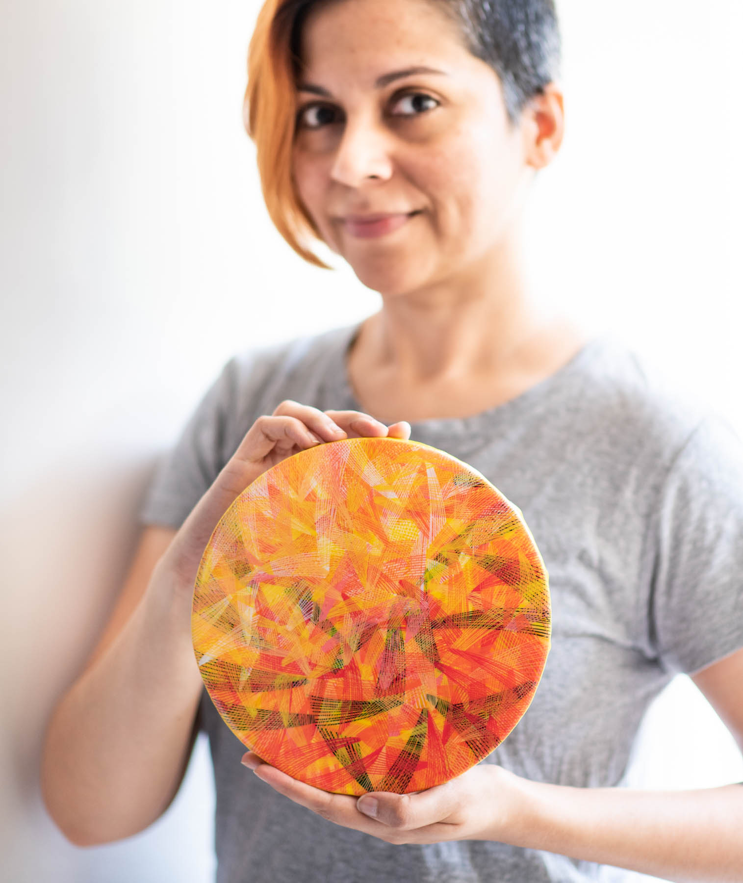 newsprint, tangerine, edition, newsprint tangerine edition, 8 inches diameter, circular canvas, naina redhu, naina.co, khaosphilos, handpainted, hand-painted, hand painted, indian contemporary art, indian contemporary artist, round canvas, acrylics on canvas, fine art, impressionism, hatching, stippling, line art, geometric abstraction, yellow, orange, lines, black, white, madeinindia, makeinindia, khaos philos, make in india, made in india, handmade in india, handmadeinindia, canvas painting, painting, art indian art, art in india, indian artist