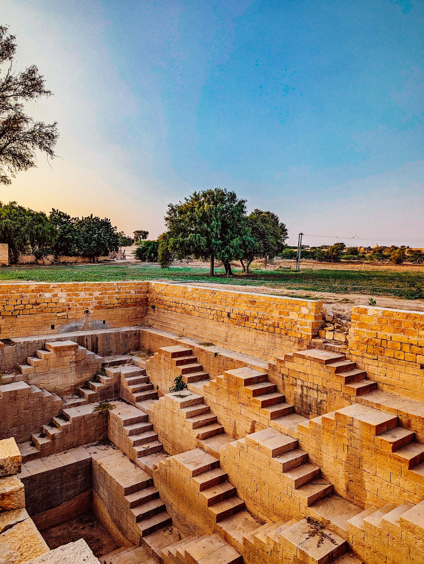 moolsagar, naina redhu, naina.co, jaisalmer, rajasthan, maharawal chaitanya raj singh, abhishti, brocade, festive wear, green shoes, green leather, silver brocade on blue, google pixel 7 pro, teampixel, nainaxgoogle, moolraj sagar, jaisalmer stepwell, jaisalmer baori, sachin singh