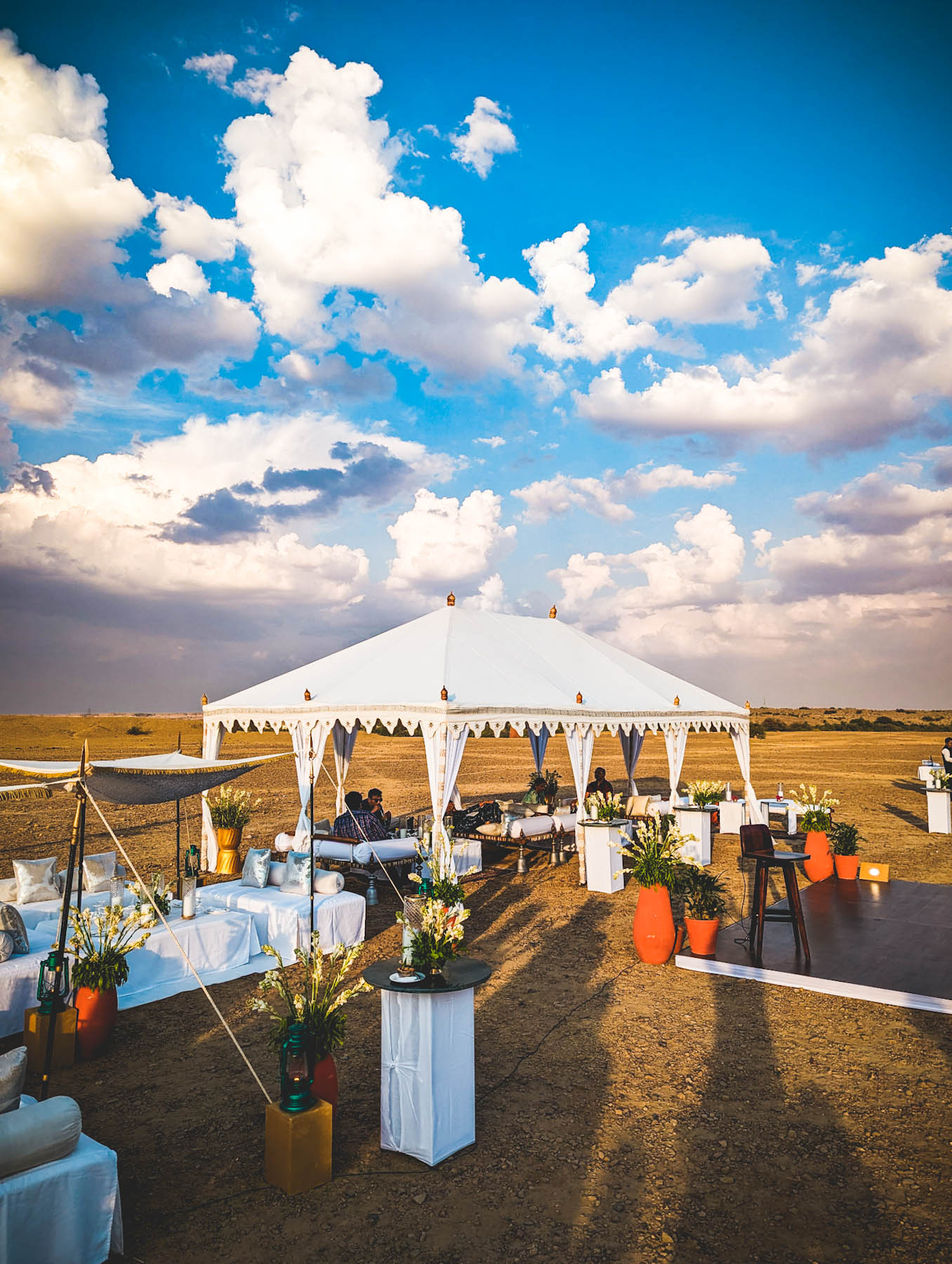 kuldhara oasis, holi sundowner, suryagarh jaisalmer, nainaxsuryagarh, holi 2023, naina.co, naina redhu, eyesfordestinations, incredible india, rajasthan, jaisalmer, desert oasis