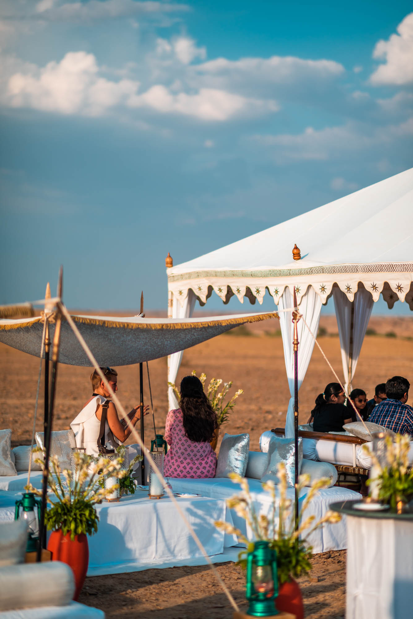 kuldhara oasis, holi sundowner, suryagarh jaisalmer, nainaxsuryagarh, holi 2023, naina.co, naina redhu, eyesfordestinations, incredible india, rajasthan, jaisalmer, desert oasis