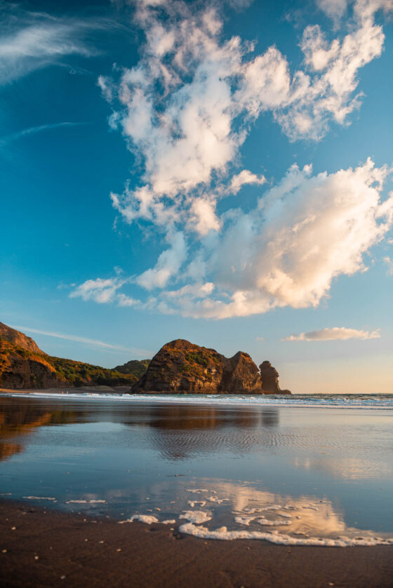 naina redhu, naina.co, new zealand, auckland, piha beach, black sand, tourism, travel photographer, ocean, self portraits, writer, blogger, experience collector, Adelaide photographer, sunset, waves, the gap